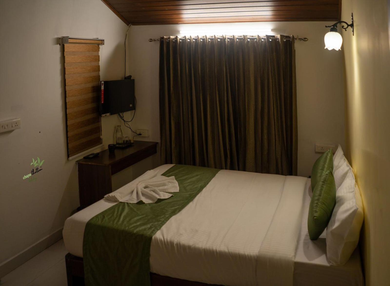 Chayathottam Holidays Apartment Munnar Bagian luar foto